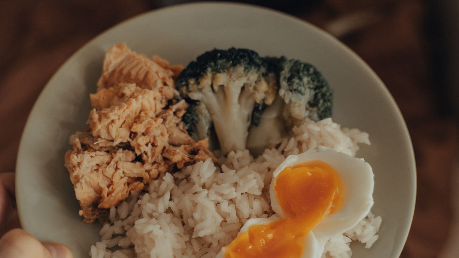 Balanced plate with rice, broccoli, egg and salmon illustrating flexible GLP-1 portion sizing